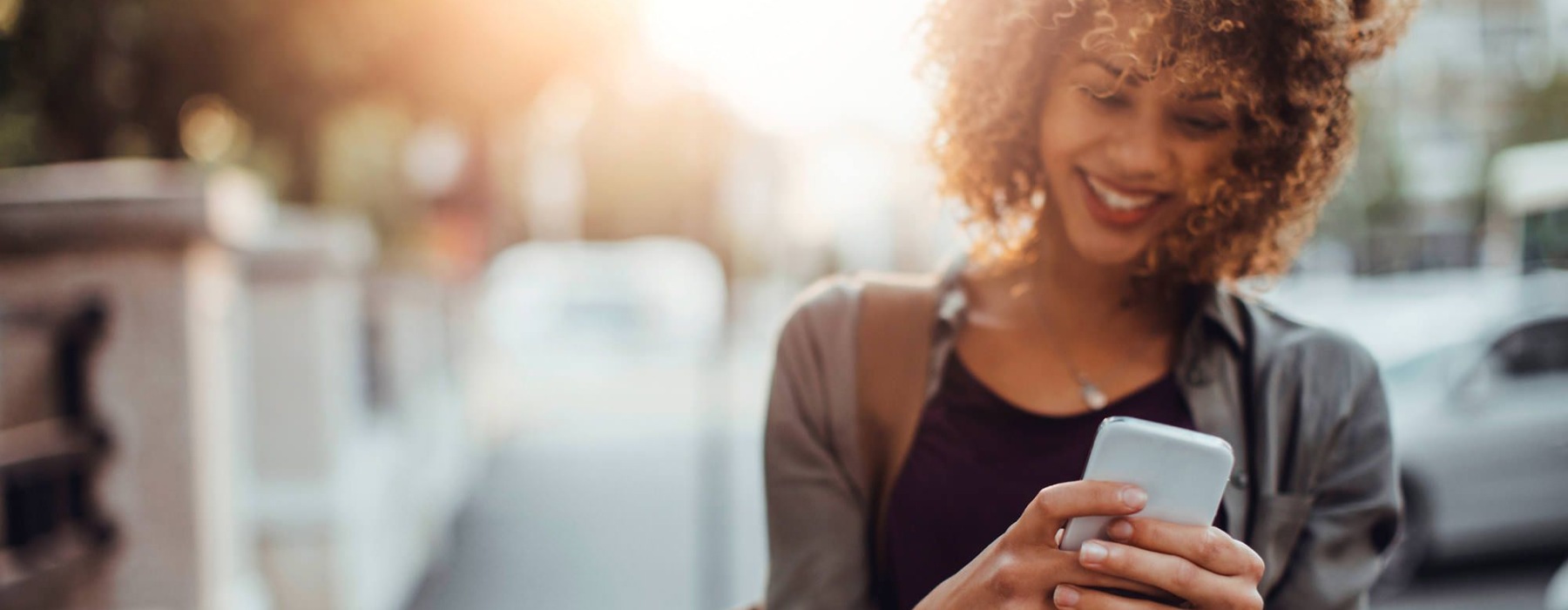 a woman holding a phone